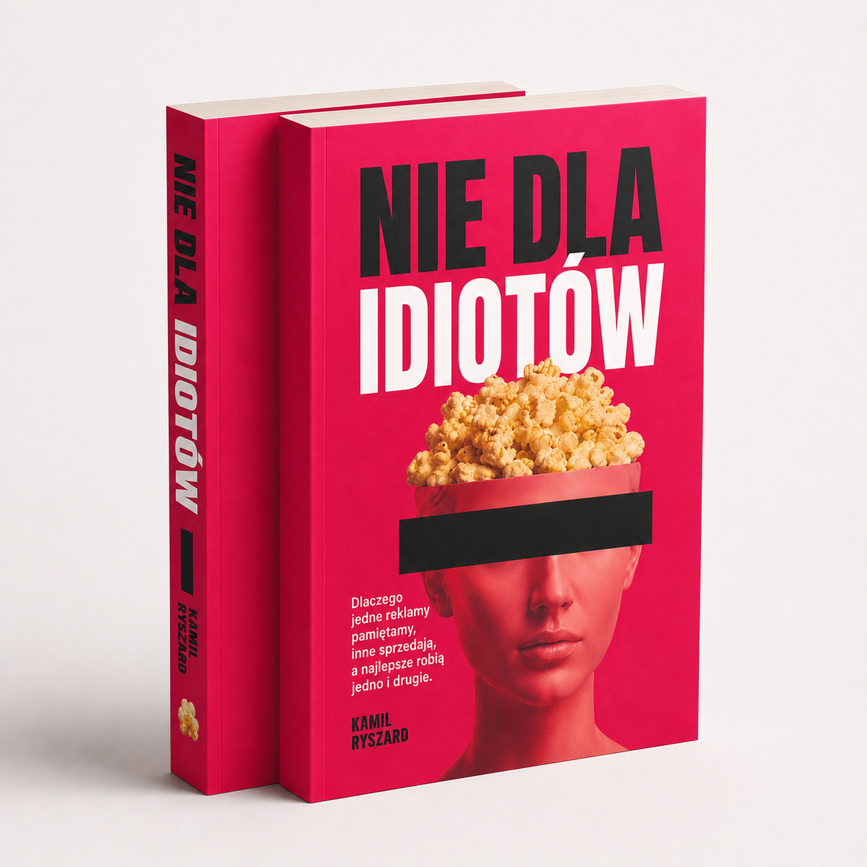 Wizualizacja dwóch egzemplarzy książki „Nie dla idiotów” obok siebie